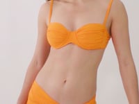 Load and play video in Gallery viewer, Video: Rio De Sol Beach Skirt Bio-Laranjada Skirt Knot
